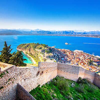 Arial view of a peninsula in nafplio greece overlooking the ocean